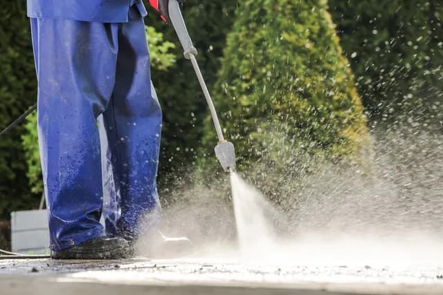 Professional drain cleaning service in Plain City, OH showing technician with advanced equipment
